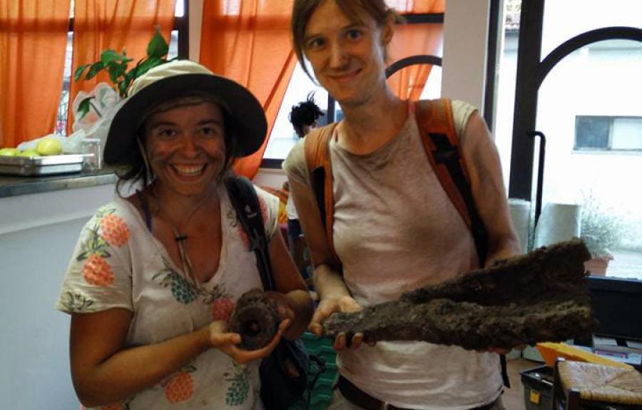 CIAMS graduate student Kathleen Garland (Phd Classics) and Prof. Van Oyen hold tools from a Roman blacksmith's workshop.